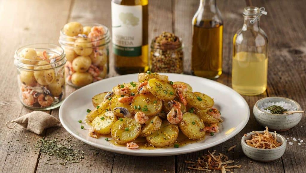 Salade tiède de pommes de terre primeurs : vinaigrette aux coquillages